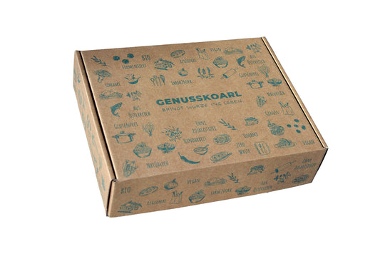 Eine Geschenkbox von Genusskoarl gefüllt mit Würzsaucen und Miso